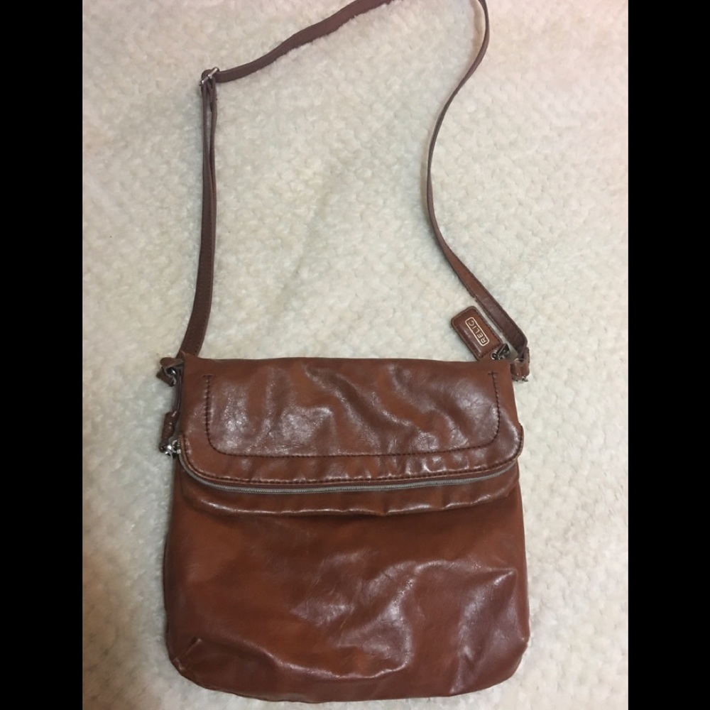 Women’s brown Relic cross body purse